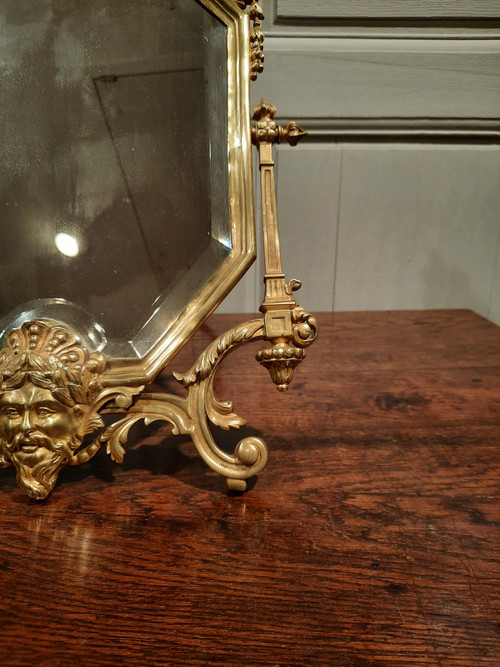Miroir de salon en bronze de style Régence d’époque XIXème siècle.