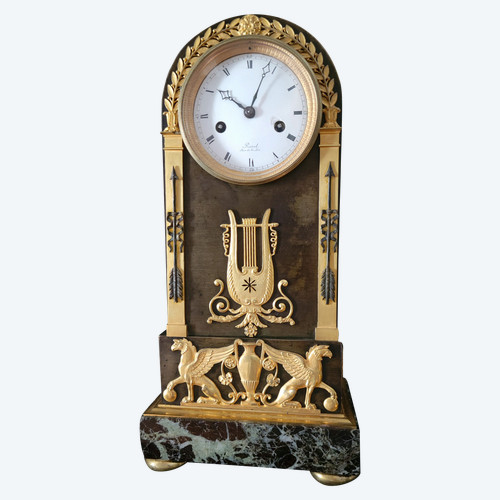  Empire style ormolu and patinated marble pendulum clock