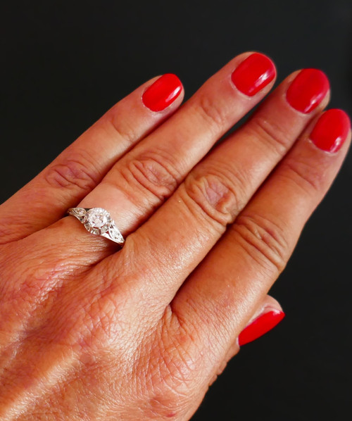 Diamond solitaire, gold and platinum setting.