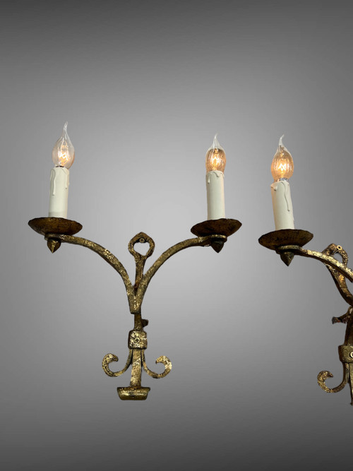 PAIR OF WALLLIGHTS BY ROBERT AND ROGER THIBIER 20th CENTURY IN GILDED AND MARTELLED IRON