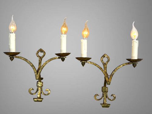 PAIR OF WALLLIGHTS BY ROBERT AND ROGER THIBIER 20th CENTURY IN GILDED AND MARTELLED IRON