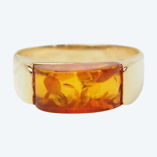 Anello a fascia in oro giallo e cabochon in ambra
