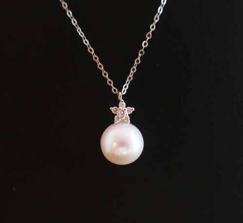 Perlen- und Diamanthalskette, 18 Karat Weißgold.