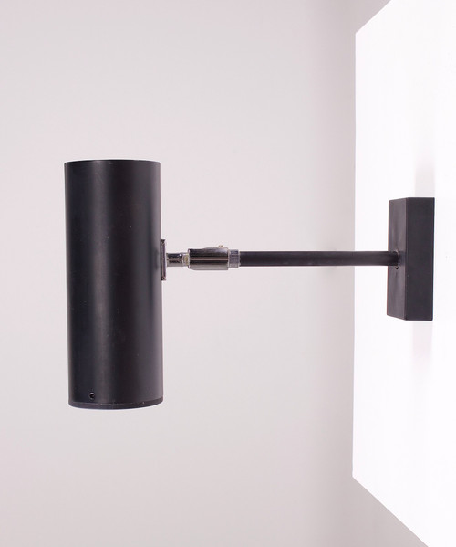 Modernistische, verstellbare Spot-Wandleuchte.