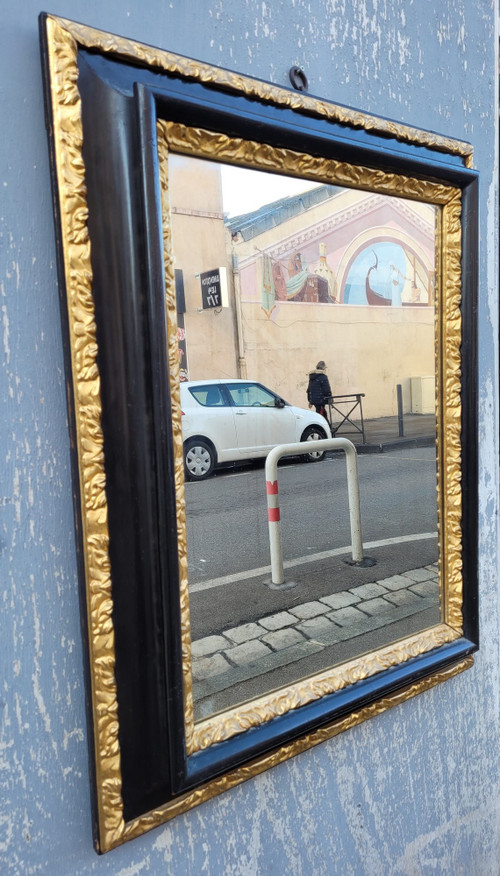 Specchio in legno annerito e dorato, XVII secolo