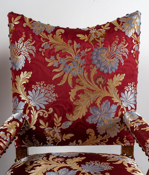 Pair of molded and carved walnut armchairs to style the hair Italy early 18th century