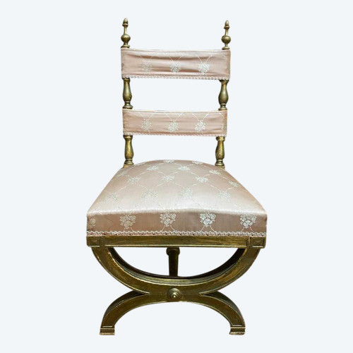 Chaise curule dorée 
