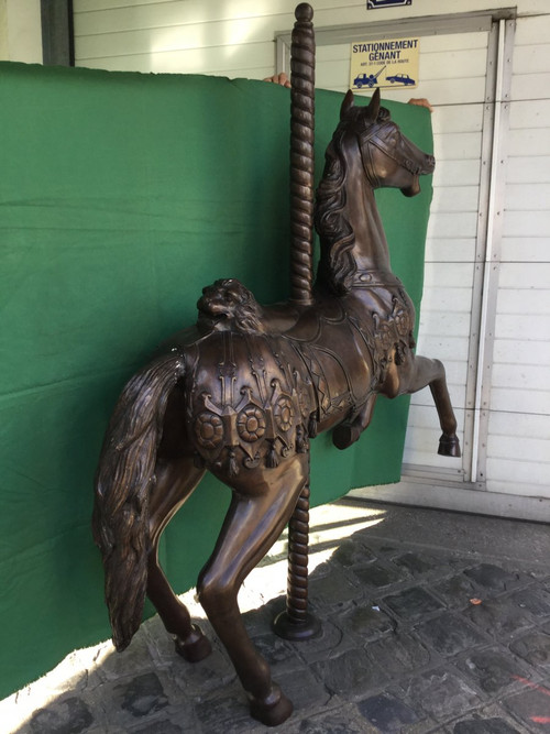 Bronze statue of a merry-go-round horse with brown patina 20th century