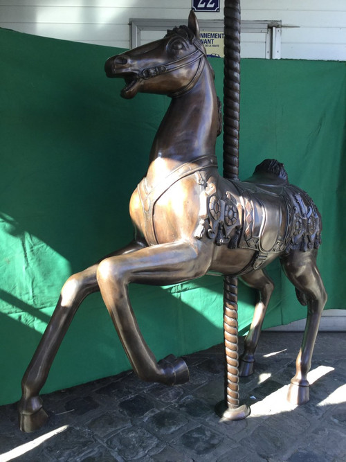 Bronze statue of a merry-go-round horse with brown patina 20th century