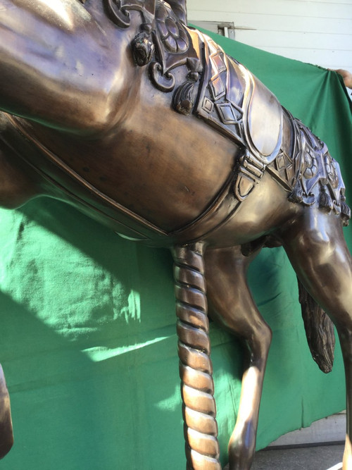 Bronze statue of a merry-go-round horse with brown patina 20th century