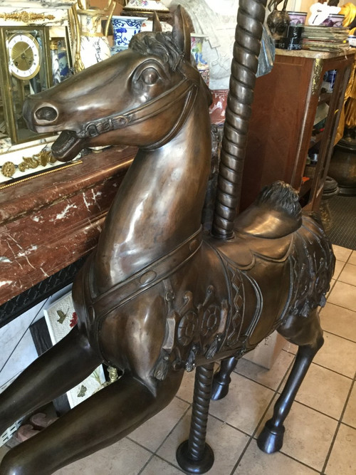Bronze statue of a merry-go-round horse with brown patina 20th century