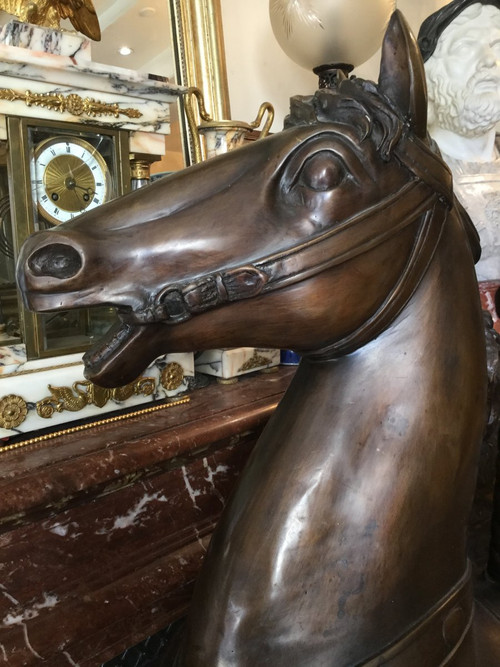 Bronze statue of a merry-go-round horse with brown patina 20th century