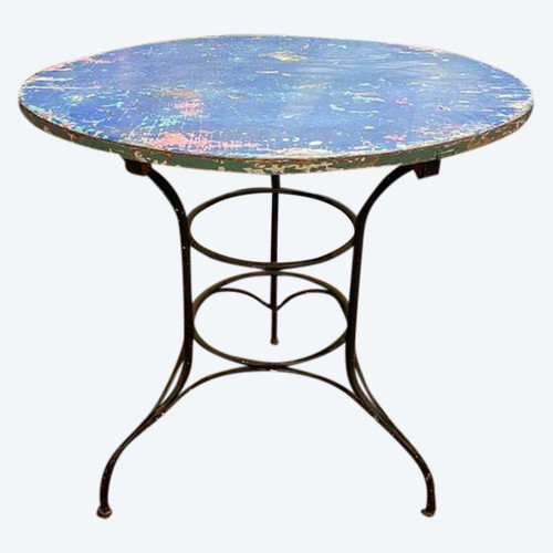 Wrought iron garden table with wooden top