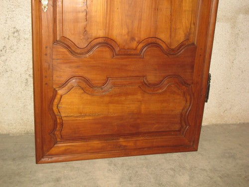 Porta in legno modanato in stile Luigi XIV in ciliegio, fine XVIII secolo 