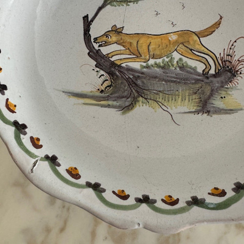 18th century Nevers earthenware salad bowl with gadrooned dog decoration