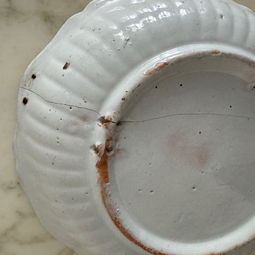 18th century Nevers earthenware salad bowl with gadrooned dog decoration