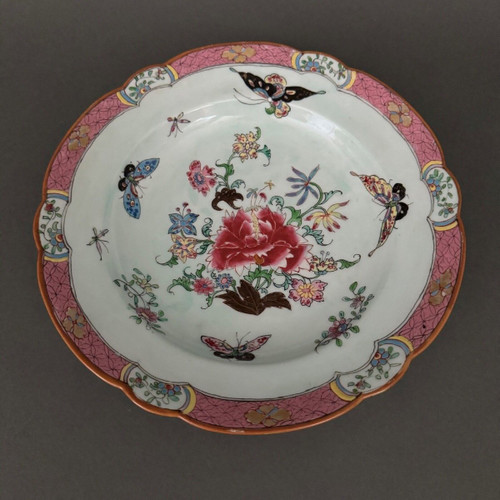 China plate with 19th century signature decorated with butterflies and vegetation