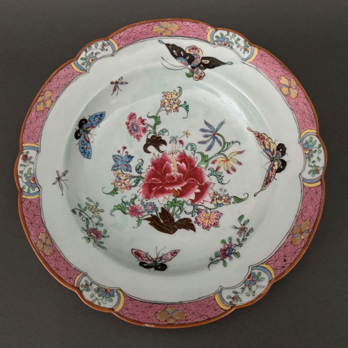 China plate with 19th century signature decorated with butterflies and vegetation
