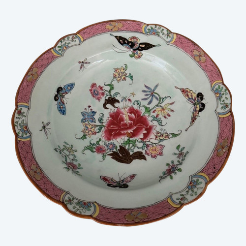 China plate with 19th century signature decorated with butterflies and vegetation