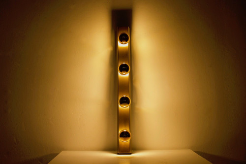 “Vanity lamp” dressing room wall lights, bronze finish.