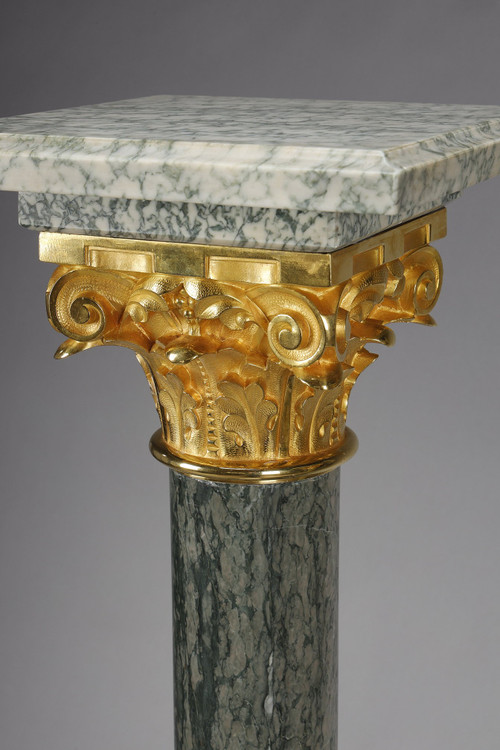 Pair of green Estours marble columns with Corinthian capitals