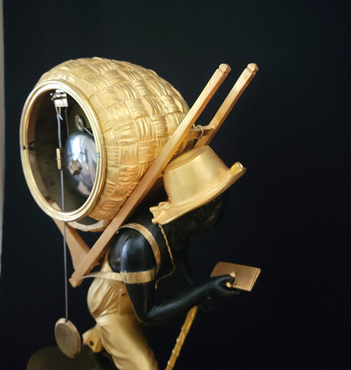 Clock the porter "le portefaix noir" after J.A.REICHE CIRCA 1810