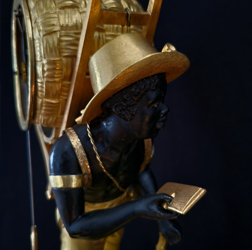 Clock the porter "le portefaix noir" after J.A.REICHE CIRCA 1810