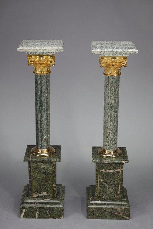 Pair of green Estours marble columns with Corinthian capitals