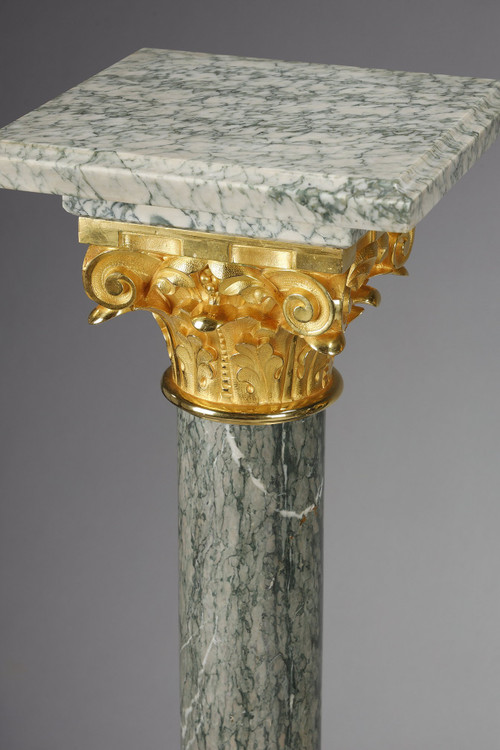 Pair of green Estours marble columns with Corinthian capitals