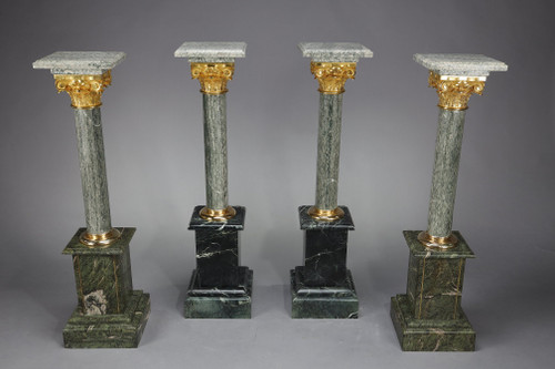 Pair of green Estours marble columns with Corinthian capitals