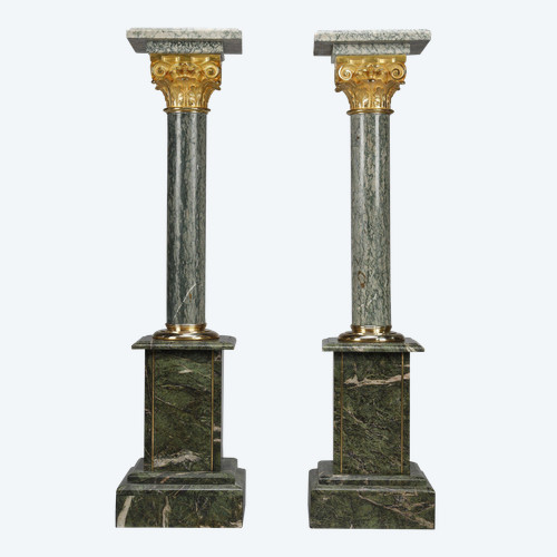 Pair of green Estours marble columns with Corinthian capitals
