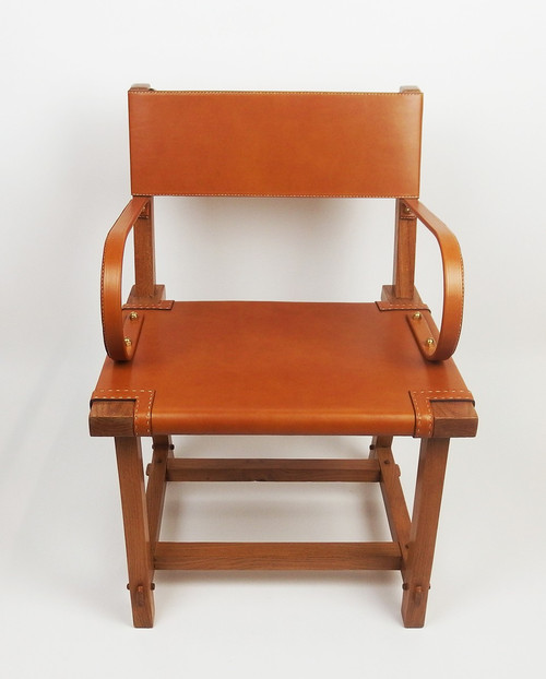 Poltrona in pelle di Jacques Adnet