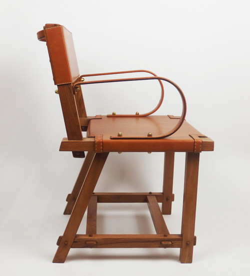 Poltrona in pelle di Jacques Adnet