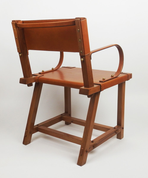 Poltrona in pelle di Jacques Adnet