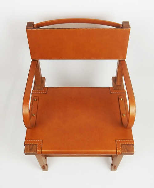 Poltrona in pelle di Jacques Adnet