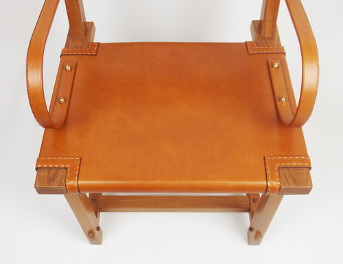 Poltrona in pelle di Jacques Adnet