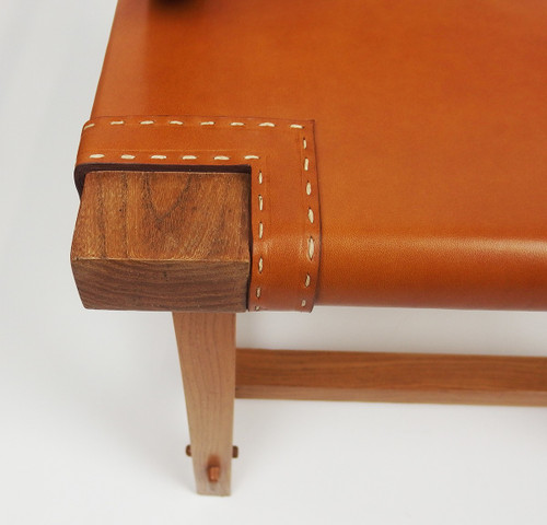 Poltrona in pelle di Jacques Adnet
