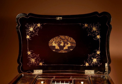 An original lacquered sewing/working table, still with the original Chinese gold paint.
