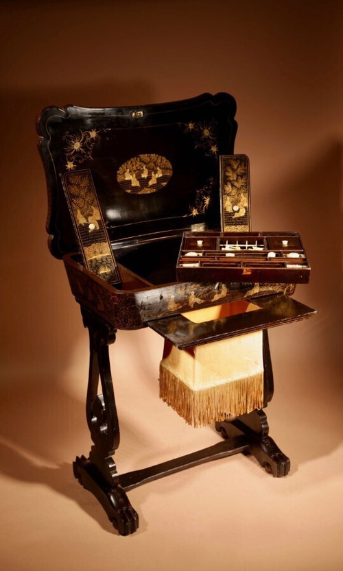 An original lacquered sewing/working table, still with the original Chinese gold paint.