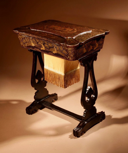 An original lacquered sewing/working table, still with the original Chinese gold paint.