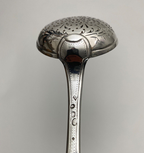 18th century silver sprinkling spoon from the Farmers General