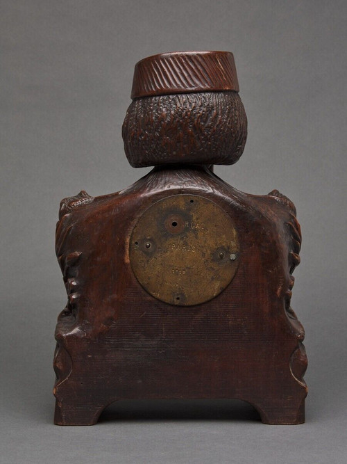 Richly ornamented carved wooden clock 19th century Chinese sage