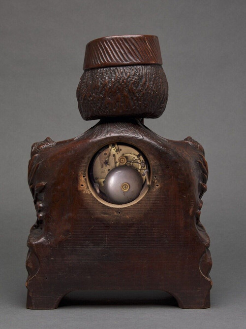 Richly ornamented carved wooden clock 19th century Chinese sage