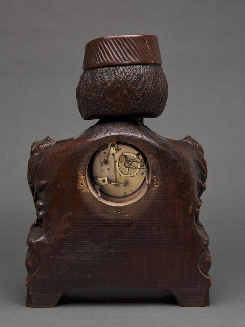 Richly ornamented carved wooden clock 19th century Chinese sage