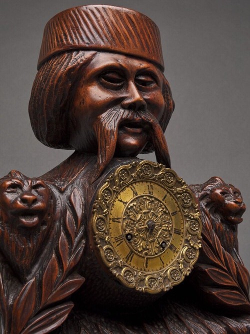 Richly ornamented carved wooden clock 19th century Chinese sage