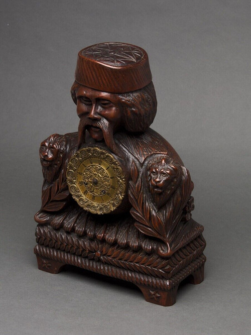 Richly ornamented carved wooden clock 19th century Chinese sage