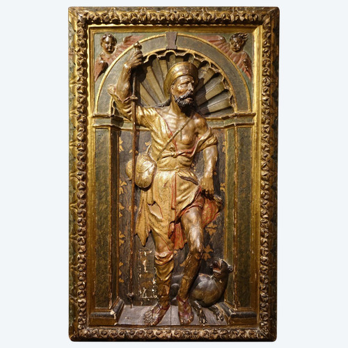 Half-relief in gilded and polychromed wood, representing Saint Roch. Spain, 16th century.