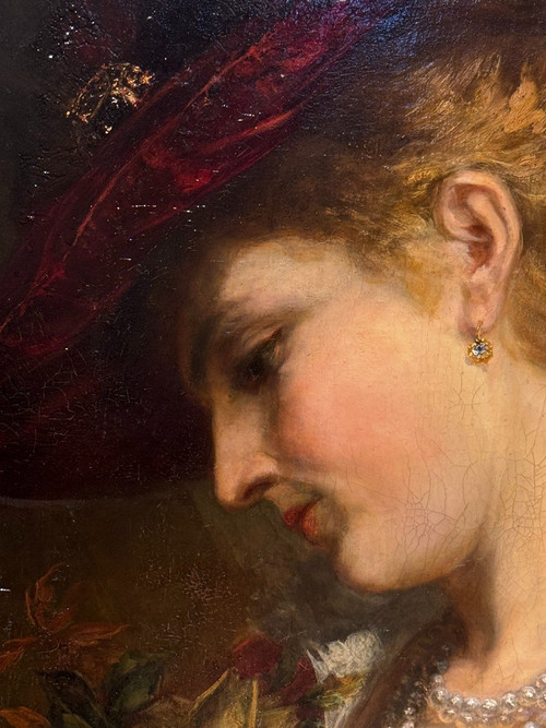 Portrait d'une jeune femme tenant un bouquet de roses. A.BRASCH 1901