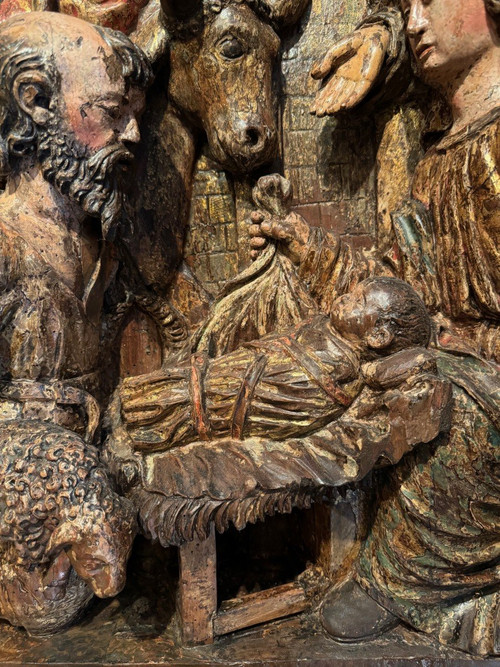 Large high relief in gilded and polychromed wood, the Adoration of the Shepherds, circa 1500