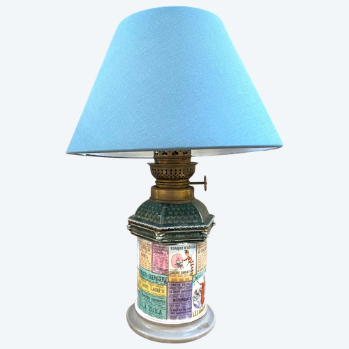 19th century porcelain lamp. Morris column. Decorated with posters of Parisian shows